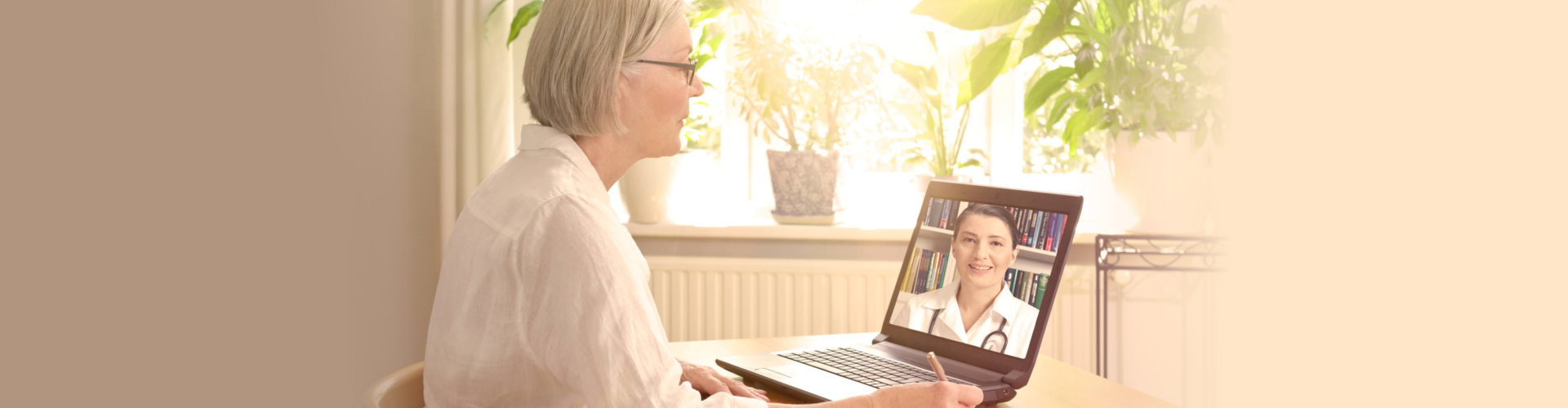 woman talking to her doctor online